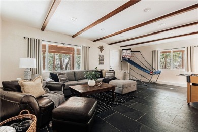 Escape to this stunning 4-bedroom, 3-bathroom mountain cabin on Lake Arrowhead Country Club in California - for sale on GolfHomes.com, golf home, golf lot