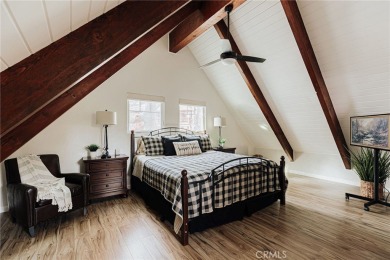 Escape to this stunning 4-bedroom, 3-bathroom mountain cabin on Lake Arrowhead Country Club in California - for sale on GolfHomes.com, golf home, golf lot