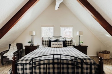 Escape to this stunning 4-bedroom, 3-bathroom mountain cabin on Lake Arrowhead Country Club in California - for sale on GolfHomes.com, golf home, golf lot