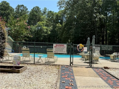 Beautiful interior lot located within the gated golf and lake on Carolina Trace Country Club in North Carolina - for sale on GolfHomes.com, golf home, golf lot