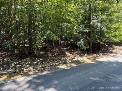 Beautiful interior lot located within the gated golf and lake on Carolina Trace Country Club in North Carolina - for sale on GolfHomes.com, golf home, golf lot