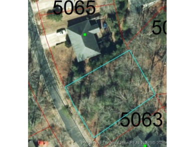 Beautiful interior lot located within the gated golf and lake on Carolina Trace Country Club in North Carolina - for sale on GolfHomes.com, golf home, golf lot