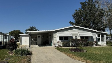 Welcome home! This completely renovated, open concept home on Orange Blossom Hills Golf and Country Club in Florida - for sale on GolfHomes.com, golf home, golf lot