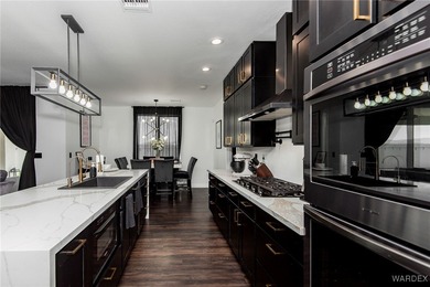 Presenting 6393 S Via De Oro, Fort Mohave, Arizona, a custom on Los Lagos Golf Club in Arizona - for sale on GolfHomes.com, golf home, golf lot