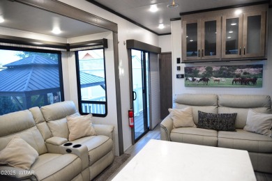 Modern living in this 2022 Cedar Creek Cottage, Destination RV on Juniper Ridge R.V. Golf Resort in Arizona - for sale on GolfHomes.com, golf home, golf lot