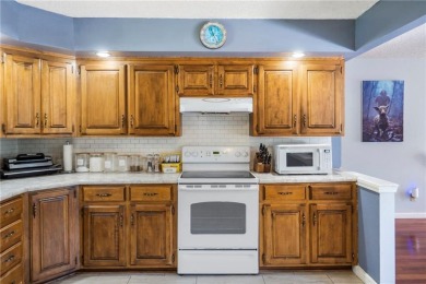 Welcome home to this well-maintained split-level residence on Bella Vista Country Club and Golf Course in Arkansas - for sale on GolfHomes.com, golf home, golf lot