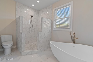 Designer renovated home in desirable Brunswick Plantation. This on Brunswick Plantation and Golf Resorts in North Carolina - for sale on GolfHomes.com, golf home, golf lot