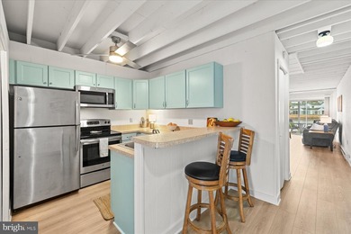 Beautifully renovated pond-front coastal retreat located just 2 on Bayside Resort Golf Club in Delaware - for sale on GolfHomes.com, golf home, golf lot