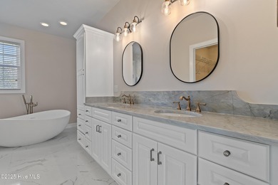 Designer renovated home in desirable Brunswick Plantation. This on Brunswick Plantation and Golf Resorts in North Carolina - for sale on GolfHomes.com, golf home, golf lot