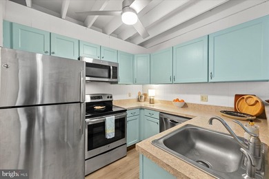 Beautifully renovated pond-front coastal retreat located just 2 on Bayside Resort Golf Club in Delaware - for sale on GolfHomes.com, golf home, golf lot