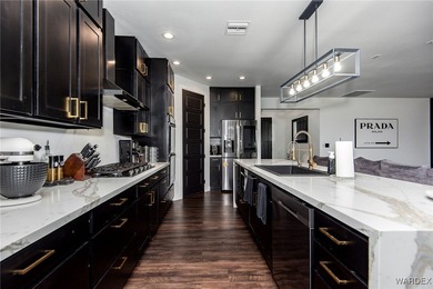 Presenting 6393 S Via De Oro, Fort Mohave, Arizona, a custom on Los Lagos Golf Club in Arizona - for sale on GolfHomes.com, golf home, golf lot