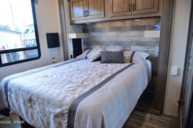 Modern living in this 2022 Cedar Creek Cottage, Destination RV on Juniper Ridge R.V. Golf Resort in Arizona - for sale on GolfHomes.com, golf home, golf lot