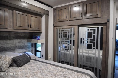 Modern living in this 2022 Cedar Creek Cottage, Destination RV on Juniper Ridge R.V. Golf Resort in Arizona - for sale on GolfHomes.com, golf home, golf lot