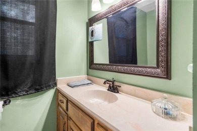 Welcome home to this well-maintained split-level residence on Bella Vista Country Club and Golf Course in Arkansas - for sale on GolfHomes.com, golf home, golf lot