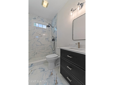 Designer renovated home in desirable Brunswick Plantation. This on Brunswick Plantation and Golf Resorts in North Carolina - for sale on GolfHomes.com, golf home, golf lot