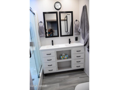 Modern living in this 2022 Cedar Creek Cottage, Destination RV on Juniper Ridge R.V. Golf Resort in Arizona - for sale on GolfHomes.com, golf home, golf lot