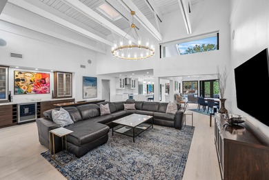 An exceptional, fully renovated retreat tucked behind a tranquil on Hamlet Country Club in Florida - for sale on GolfHomes.com, golf home, golf lot