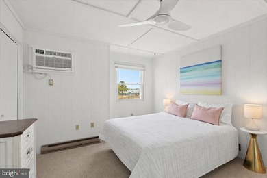 Beautifully renovated pond-front coastal retreat located just 2 on Bayside Resort Golf Club in Delaware - for sale on GolfHomes.com, golf home, golf lot