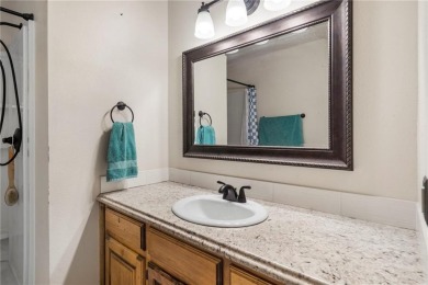 Welcome home to this well-maintained split-level residence on Bella Vista Country Club and Golf Course in Arkansas - for sale on GolfHomes.com, golf home, golf lot