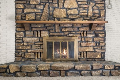 Welcome home to this well-maintained split-level residence on Bella Vista Country Club and Golf Course in Arkansas - for sale on GolfHomes.com, golf home, golf lot