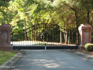 Beautiful waterfront homesite in a gated coastal community on Lockwood Folly Country Club in North Carolina - for sale on GolfHomes.com, golf home, golf lot