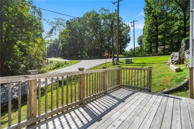 Welcome home to this well-maintained split-level residence on Bella Vista Country Club and Golf Course in Arkansas - for sale on GolfHomes.com, golf home, golf lot