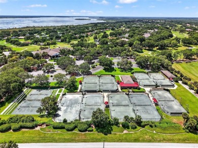 Come discover this stunning residence situated in Harbor Hills on Harbor Hills Country Club in Florida - for sale on GolfHomes.com, golf home, golf lot