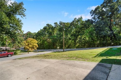 Welcome home to this well-maintained split-level residence on Bella Vista Country Club and Golf Course in Arkansas - for sale on GolfHomes.com, golf home, golf lot