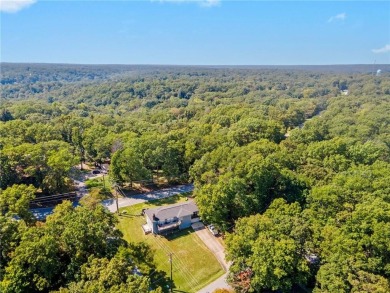 Welcome home to this well-maintained split-level residence on Bella Vista Country Club and Golf Course in Arkansas - for sale on GolfHomes.com, golf home, golf lot