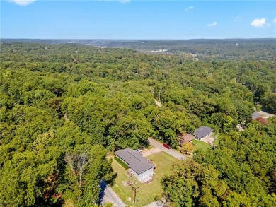 Welcome home to this well-maintained split-level residence on Bella Vista Country Club and Golf Course in Arkansas - for sale on GolfHomes.com, golf home, golf lot