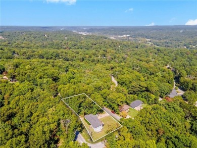 Welcome home to this well-maintained split-level residence on Bella Vista Country Club and Golf Course in Arkansas - for sale on GolfHomes.com, golf home, golf lot