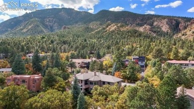 Set in a prime location behind the Broadmoor Hotel. City views on Broadmoor Golf Club in Colorado - for sale on GolfHomes.com, golf home, golf lot