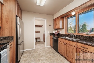 This charming, meticulously maintained 4 bed, 3 bath 2542 sq. ft on Lake Hills Golf Course in Montana - for sale on GolfHomes.com, golf home, golf lot