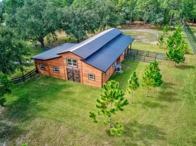 Quiet Country Living on over 4 ACRES! NOV 2023 ROOF! This on Wedgefield Golf Club in Florida - for sale on GolfHomes.com, golf home, golf lot