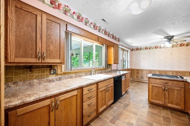 Don't miss this well maintained brick ranch with many features on Prairie Vista Golf Course in Illinois - for sale on GolfHomes.com, golf home, golf lot