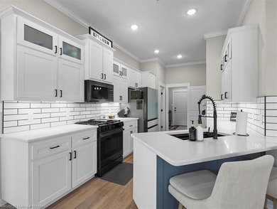 This stunning 4-bedroom, 2-bath home blends modern design with on Wolf Ridge Golf Course in Oklahoma - for sale on GolfHomes.com, golf home, golf lot