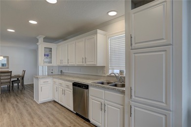 Beautifully maintained 2021 home offering over 2,000 sq ft of on Barefoot Bay Golf Course in Florida - for sale on GolfHomes.com, golf home, golf lot