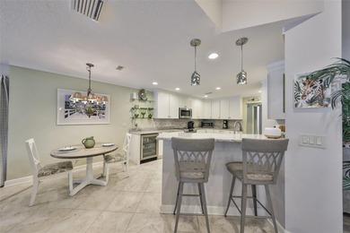 WELCOME TO YOUR OWN PIECE OF PARADISE WITH A WATER VIEW FROM on Caloosa Greens Executive Golf Course in Florida - for sale on GolfHomes.com, golf home, golf lot