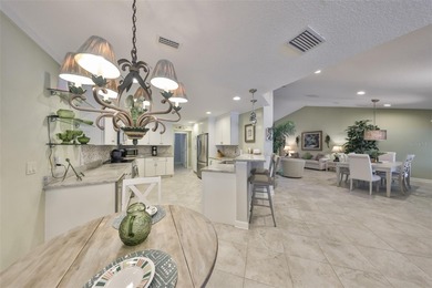 WELCOME TO YOUR OWN PIECE OF PARADISE WITH A WATER VIEW FROM on Caloosa Greens Executive Golf Course in Florida - for sale on GolfHomes.com, golf home, golf lot