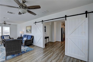 Beautifully maintained 2021 home offering over 2,000 sq ft of on Barefoot Bay Golf Course in Florida - for sale on GolfHomes.com, golf home, golf lot