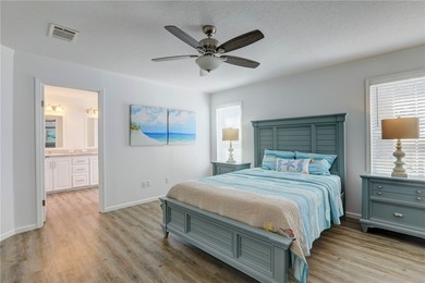 Beautifully maintained 2021 home offering over 2,000 sq ft of on Barefoot Bay Golf Course in Florida - for sale on GolfHomes.com, golf home, golf lot