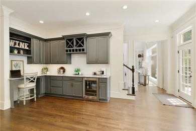 Exquisite and beautifully updated home nestled in the exclusive on The Golf Club of Georgia in Georgia - for sale on GolfHomes.com, golf home, golf lot