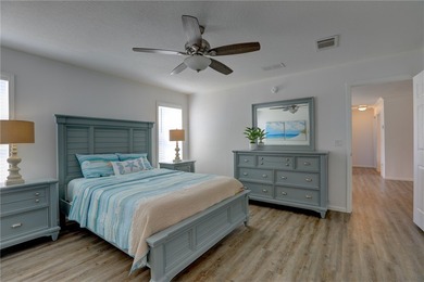 Beautifully maintained 2021 home offering over 2,000 sq ft of on Barefoot Bay Golf Course in Florida - for sale on GolfHomes.com, golf home, golf lot