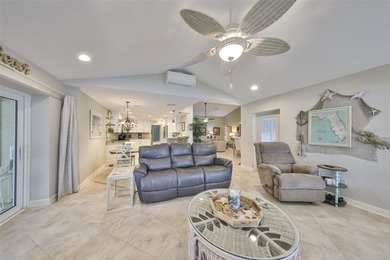 WELCOME TO YOUR OWN PIECE OF PARADISE WITH A WATER VIEW FROM on Caloosa Greens Executive Golf Course in Florida - for sale on GolfHomes.com, golf home, golf lot