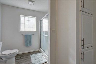 Beautifully maintained 2021 home offering over 2,000 sq ft of on Barefoot Bay Golf Course in Florida - for sale on GolfHomes.com, golf home, golf lot