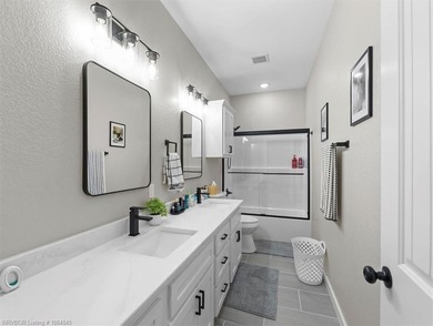 This stunning 4-bedroom, 2-bath home blends modern design with on Wolf Ridge Golf Course in Oklahoma - for sale on GolfHomes.com, golf home, golf lot