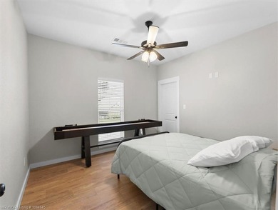 This stunning 4-bedroom, 2-bath home blends modern design with on Wolf Ridge Golf Course in Oklahoma - for sale on GolfHomes.com, golf home, golf lot