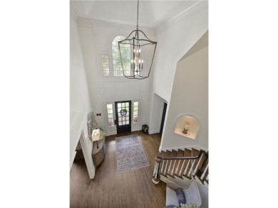 Exquisite and beautifully updated home nestled in the exclusive on The Golf Club of Georgia in Georgia - for sale on GolfHomes.com, golf home, golf lot
