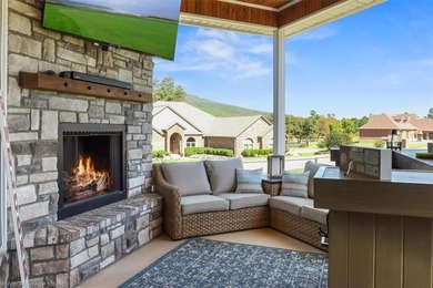 This stunning 4-bedroom, 2-bath home blends modern design with on Wolf Ridge Golf Course in Oklahoma - for sale on GolfHomes.com, golf home, golf lot