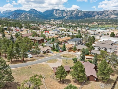 Step inside this charming rustic cabin that offers a peaceful on Estes Park Golf Course in Colorado - for sale on GolfHomes.com, golf home, golf lot